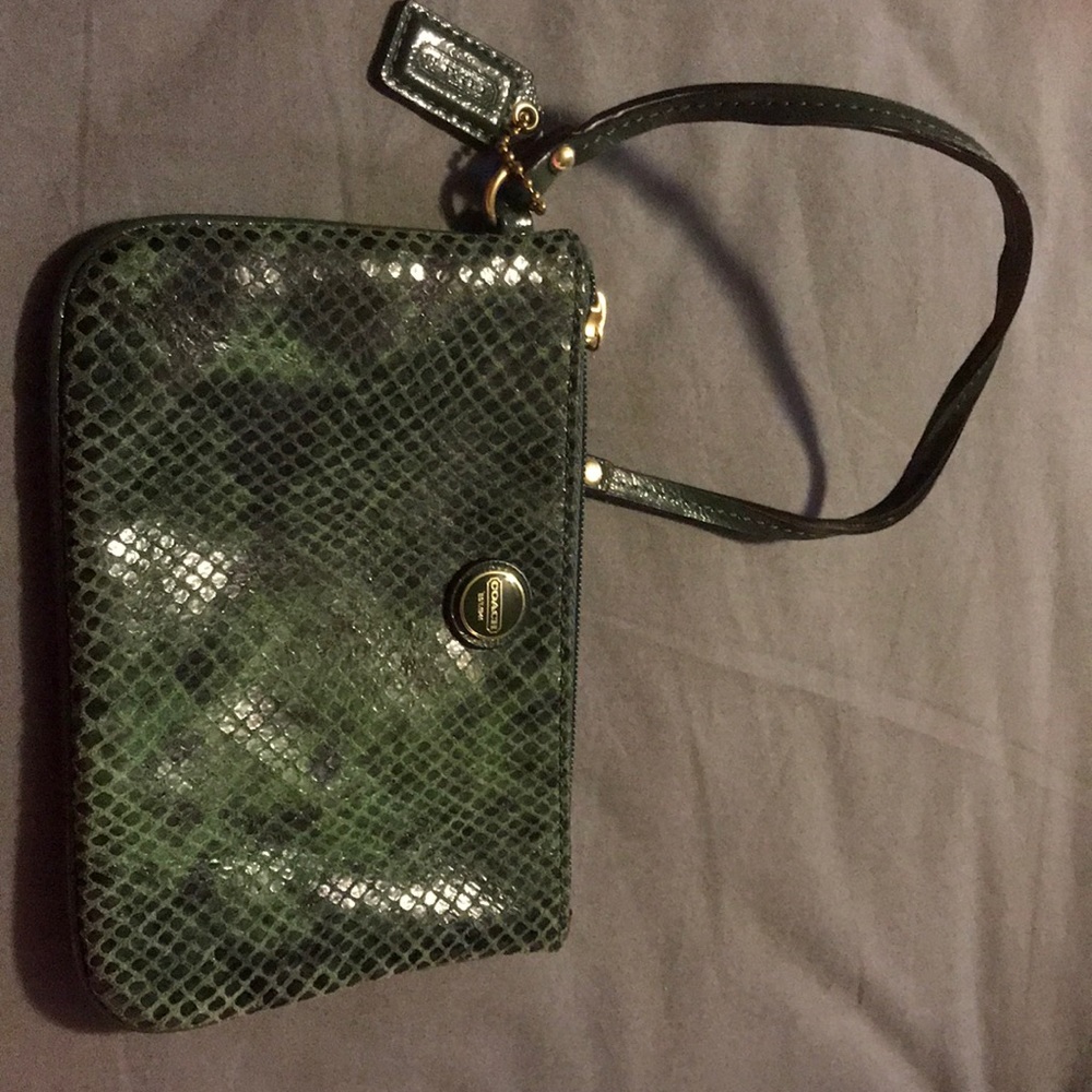 Coach wristlet Greenland black snackskin color